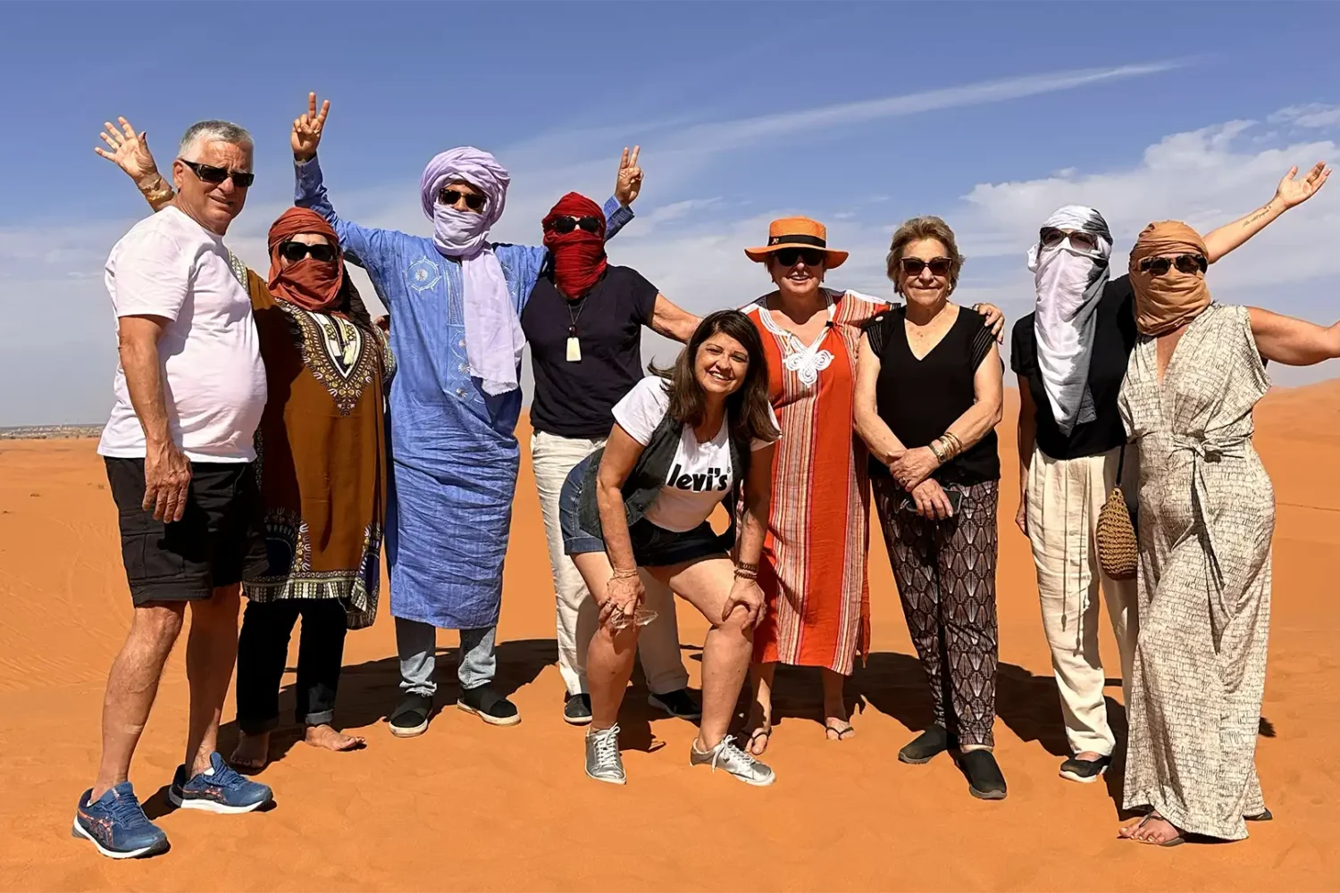 A vibrant scene in Sahara desert experienced by travelers on one of our Morocco tours small group.